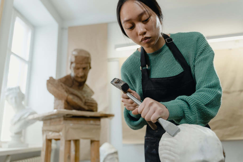 picture of a woman sculpting
