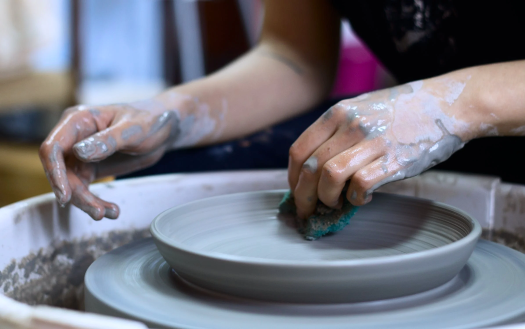 pottery as a hobby. pic of a person making pottery