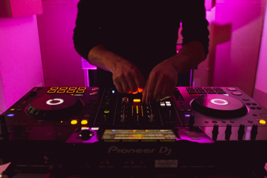 8. DJing For Added Fun (pic: Dj mixing music)