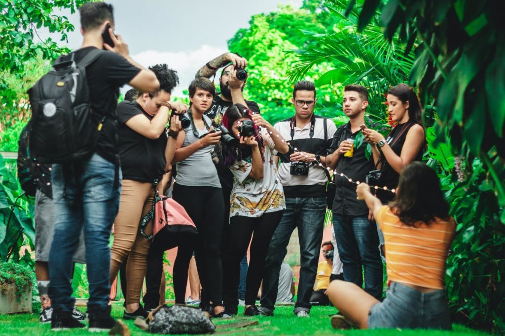 group of people near trees: best photography niches that pay well