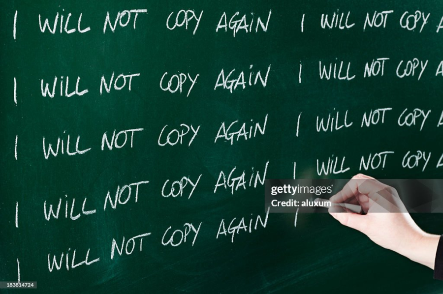 pic: "i will not copy again" sentence repeated in a board written by a person with chalk. topic: checking plagiarism
