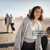 Hobbies for Women in Their 30s - pic: Happy mother and son walking on the beach
