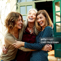 Best Hobbies for Women in Their 40s - pic: Playful mother and daughters embracing outside house