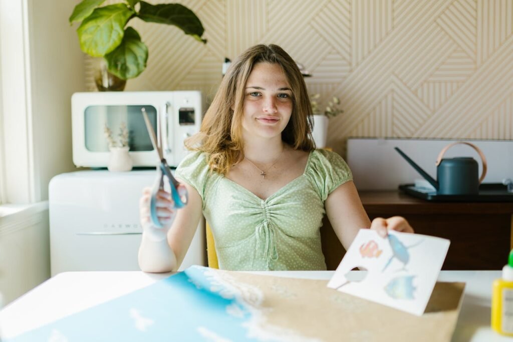 woman at home making craft painting hobby